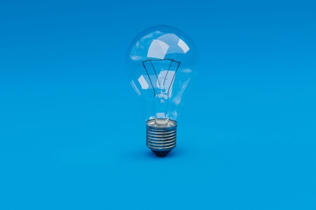retro style lightbulbs with glowing filament standing on infinite background; creativity design...