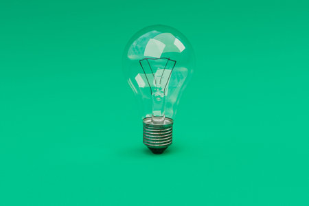 retro style lightbulbs with glowing filament standing on infinite background; creativity design...