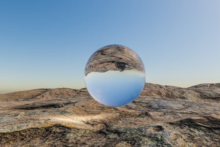 glas sphere ball hovering in the air in large empty desert environment; abstract surreal concept; 3D Illustrationの写真素材