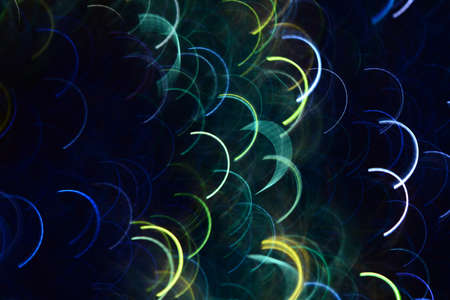 Abstract photo by blue and green semicircular light lines to background.の写真素材