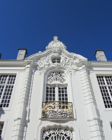 A very ornate exterior wall and clock  Rococo style  of the Town Hall in Aalst, East Flanders, Belgium                              のeditorial素材