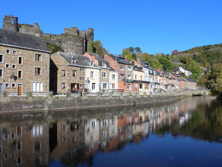 LA ROCHE EN ARDENNE, BELGIUM, OCTOBER 14 2017: View over the river Ourthe to the ruins of the feudal castle in La Roche en Ardenne. A historic town and a very popular tourist destination in Wallonia.のeditorial素材
