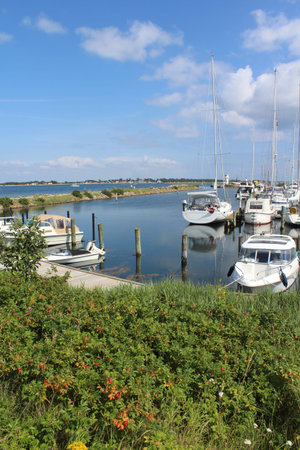 View of the picturesque Aarosund harbour (Lystbadehavn) near Haderslev in Denmark, looking accross...