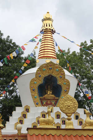 DOKKUM, NETHERLANDS, 15 JULY 2020: Traditional golden stupa of a tibetan buddhist temple. Karma Deleg Chのeditorial素材