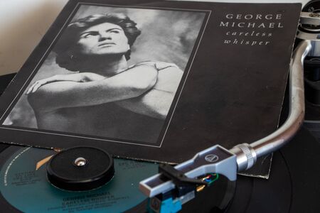 Naples, Italy 20 August 2019. Record player with vinyls in the foreground.のeditorial素材