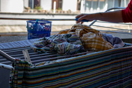 Rome, April 22, 2020. Quarantine has forced us to do simple things. Hang the laundry in the sun to dry it.のeditorial素材