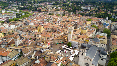 Shooting with drone on Trento, famous Trentino city near the Adige river in northern Italyの写真素材