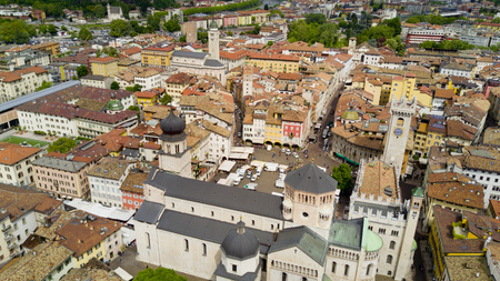 Shooting with drone on Trento, famous Trentino city near the Adige river in northern Italyの写真素材