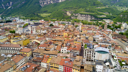 Shooting with drone on Trento, famous Trentino city near the Adige river in northern Italyの写真素材