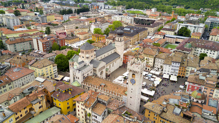 Shooting with drone on Trento, famous Trentino city near the Adige river in northern Italyの写真素材