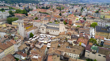 Shooting with drone on Trento, famous Trentino city near the Adige river in northern Italyの写真素材