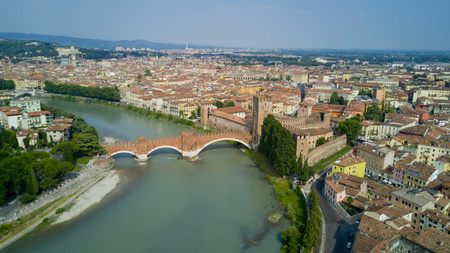 Aerial shooting with the drone of Verona, the city on the Adige river in Veneto, famous for Romeo and Juliet and Shakespeare's play, has been awarded the World Heritage Site by UNESCO because of its urban structure and architectureの写真素材