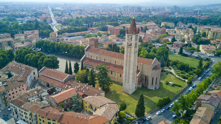 Aerial shooting with the drone of Verona, the city on the Adige river in Veneto, famous for Romeo and Juliet and Shakespeare's play, has been awarded the World Heritage Site by UNESCO because of its urban structure and architectureの写真素材