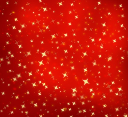 Christmas abstract background with golden stars sharp and blurの写真素材