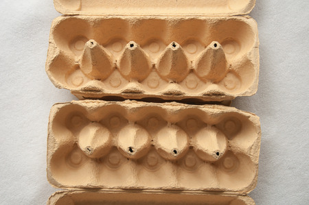 Two simmilar Egg Cartons side by sideの写真素材