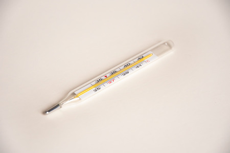a photo of a thermometer closeup on a light backgroundの写真素材