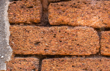 Close-up surface of orange laterite backgroundの写真素材