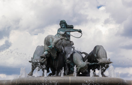 Statue of oxen driven by Norse goddess on Gefion fountain in Copenhagen, Denmarkのeditorial素材