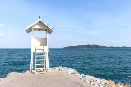 White wooden observation tower with background of Samet island at Khao Laem Ya National Park, Rayong, Thailandの写真素材