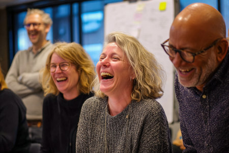 A laughter and joy during group meeting, capturing spontaneous moment of connection and happinessの素材