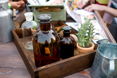 Bottle in wooden box at festival marketの写真素材