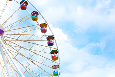 Ferris wheel on cloudy sky backgroundの写真素材