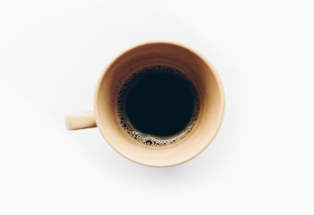 Top view a cup of coffee on white background, isolatedの写真素材