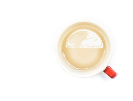 Top view a cup of tea on white background, isolated, minimal styleの写真素材