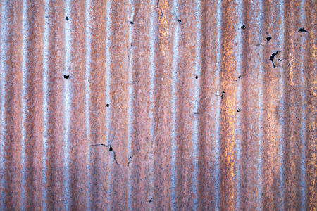 Old rusty galvanized with hole.の写真素材