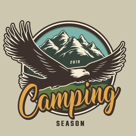 Vintage camping colorful logotype with eagle flying on mountains landscape isolated vector illustrationのイラスト素材