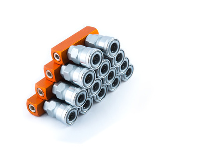 Orange Quick coupler set isolated on white backgroundの写真素材