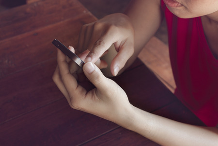 Close Up Of A Woman Using Mobile Smart Phonの写真素材