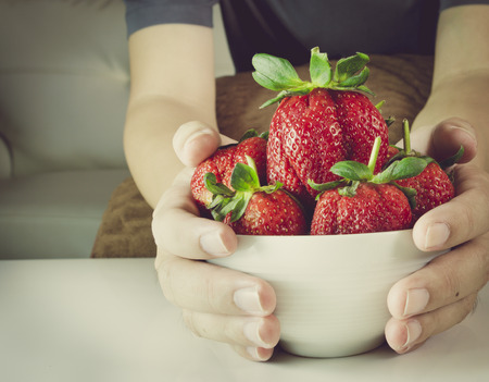 strawberry in bowl - vintage style effect pictureの写真素材