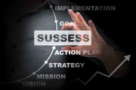 Businessman hand shows success chart concept2の写真素材
