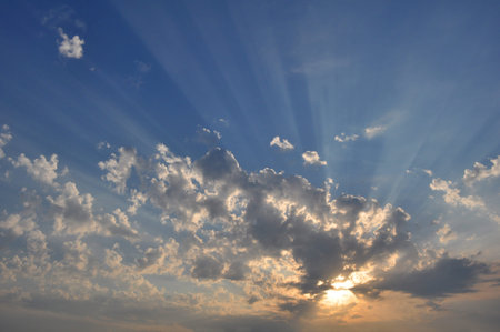Sunset, sunrise with clouds, light rays