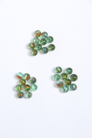 Colored marbles divided into groupsの写真素材