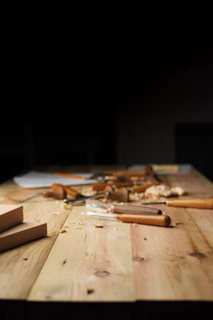 Woodworkers desk concept with free space on top. Focus on an empty space in the foreground. Mockup background for product presentationの写真素材