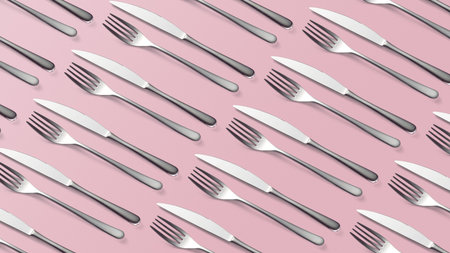 Set Cutlery Pattern of Fork and knife top view on pink Stylish classy elegant metallic eating knife and fork cutlery for dining kitchen utensilsの写真素材