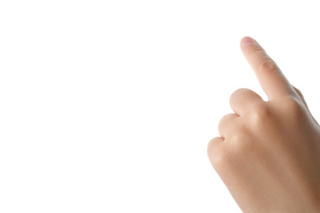 Index finger of a child hand is touching a virtual screen, isolated on white background. Clipping path included.の写真素材