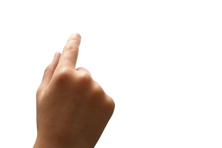 Child right hand pointing up, isolated photo. Little boys hand touches the touch screen concept, Clipping path, Copy free space.の写真素材
