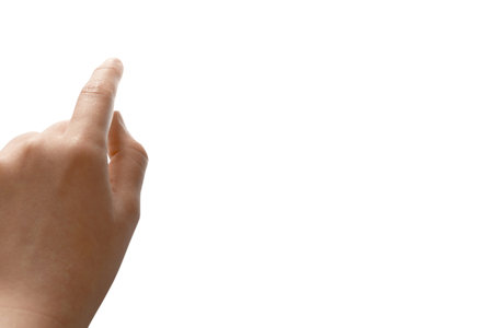 Empowering Gesture of a Childs Index Finger Pointing Up. Clipping path and copy free space on right.の写真素材