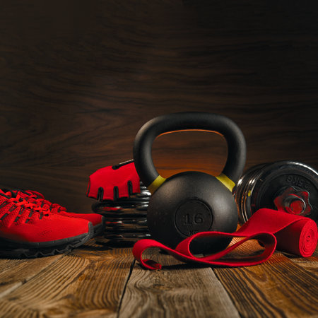 Black kettlebell close-up on a fitness equipment background.の写真素材