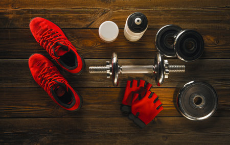 Sports equipment on a black background. Top view. Motivational.の写真素材