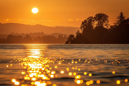 sunset,water,sun,sea,landscape,sky,ocean,nature,lake,sunrise,evening,light,reflection,dusk,travel,coast,beautiful,scene,summer,horizon,scenery,outdoor,day,tranquil,calm,view,tree,cloud,golden,orange,sunlight,morning,natural,beauty,nobody,vacation,relaxation,environment,tourism,seascapeの素材