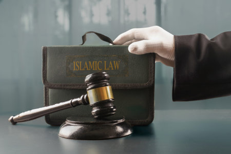 Islamic law concept with copy space , mallet of judge, wooden gavel on books