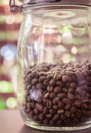 coffee bean in jar can do many coffee cupの写真素材