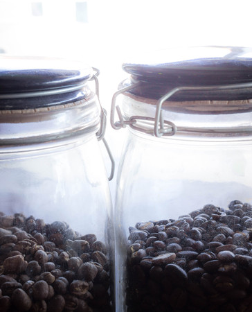 coffee beans in jar can do many hot and ice coffeeの写真素材