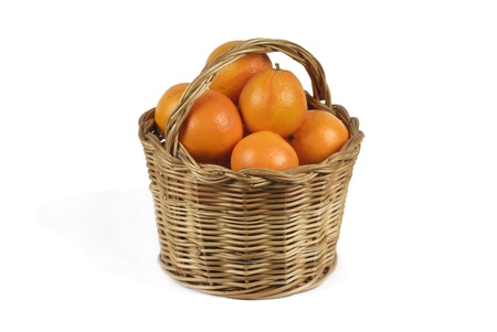 Basket of oranges on a white backgroundの写真素材