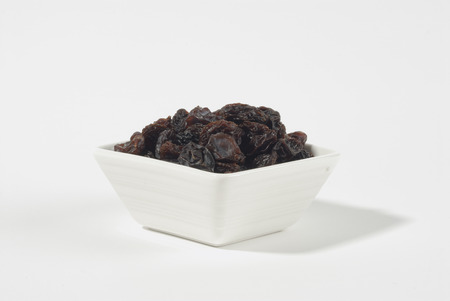 raisins in a ceramic bowlの写真素材