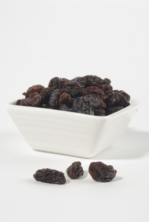 raisins in a ceramic bowlの写真素材